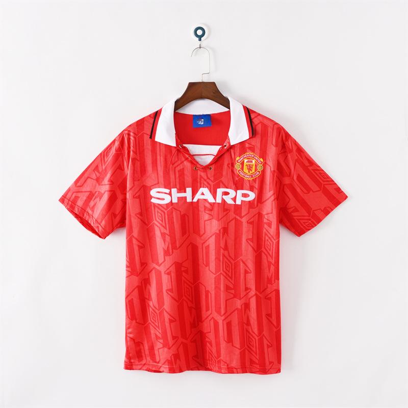 Manchester United Retro-Trikots Sporttrikots gibt es in verschiedenen Stilen, und das WM-Fußballtrikot ist ein Haarhersteller.