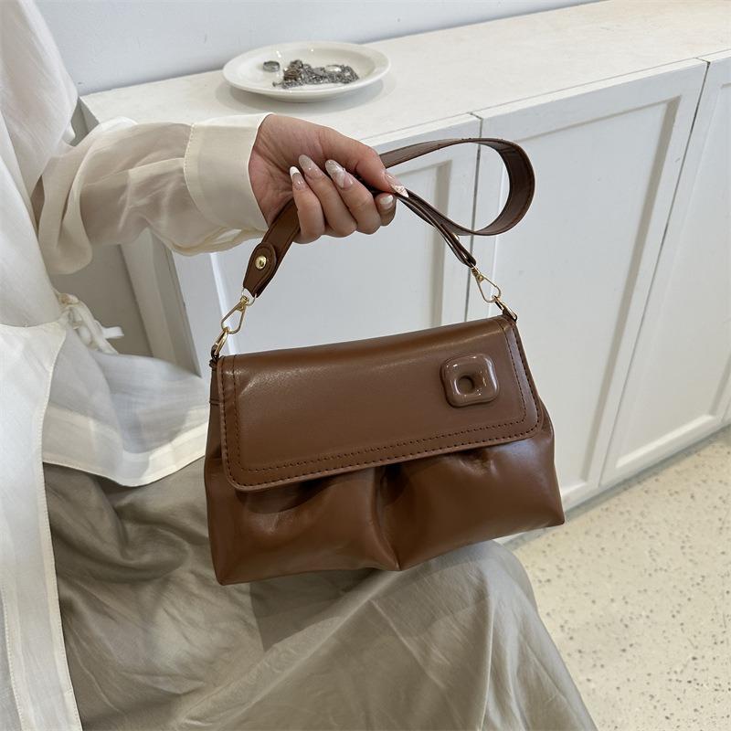 Simple and fashionable women's bag cloud pleated soft leather texture shoulder backpack niche design solid color messenger bag