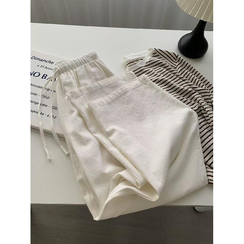 Women's white casual pants, spring/summer 2026, loose high-waisted, elegant straight-leg pants