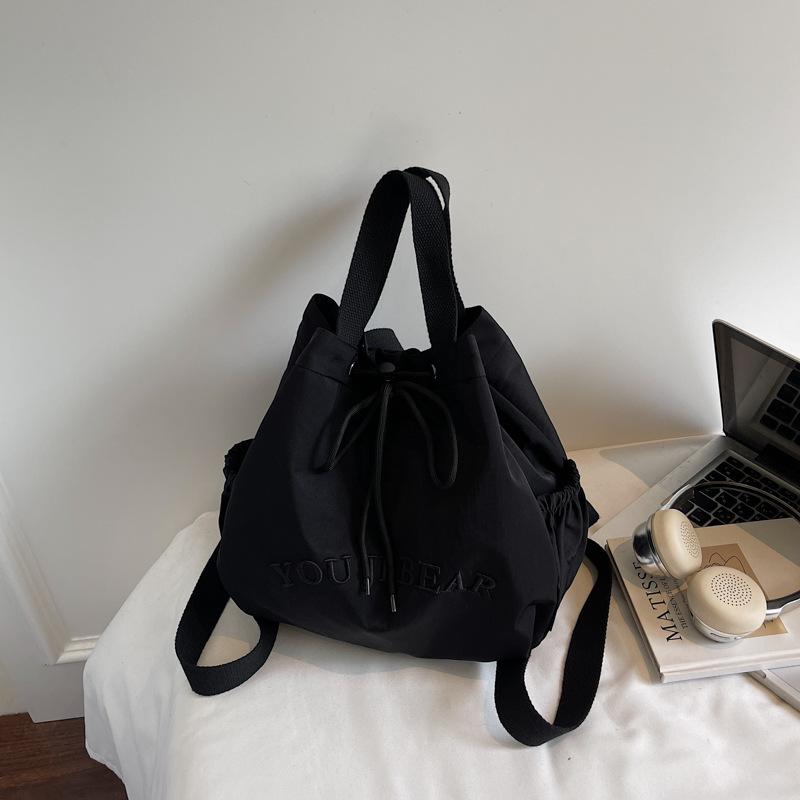 

Korean niche Mori drawstring popular bucket water bag 2025 autumn new simple cloth bag women s shoulder bag