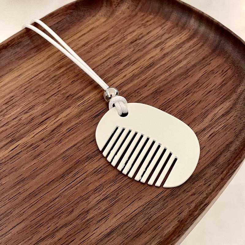 

Металлическая краска-спрей плоская круглая подвеска-расческа ожерелье легкая роскошь нишевый дизайн высокое чувство темперамента универсальное изысканное ожерелье