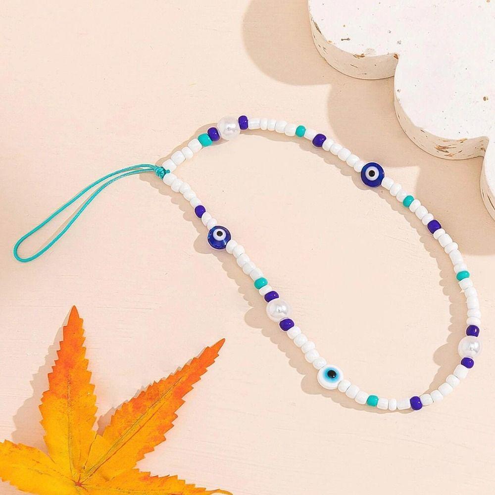 

Стеклянные рисовые бусины Телефонный шнурок Винтажная мода Ремешок для мобильного телефона Брелок синий