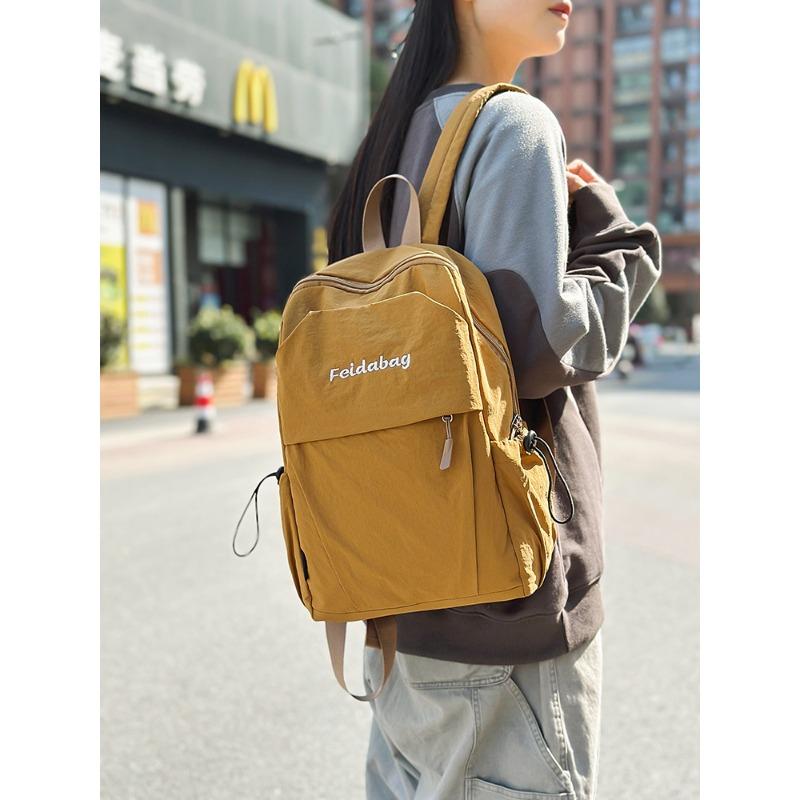 

Повседневный студенческий рюкзак новый нейлоновый парный дорожный рюкзак дорожный универсальный коричневый