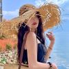 Elegant Raffia Sun Hat With Wide Brimmed And Breathable Openwork Design For Beach Vacation And Outdoor Activities