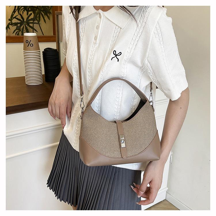 High-end contrasting color niche design bag women's new versatile commuter portable shoulder messenger women's bag