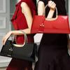 Mode Licht Kleber Lack Leder Handheld One Shoulder Bankett Damen Tasche