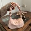 Heutige beliebte gefaltete Schultergurt-Wolken-Tasche Damen Frühling Neu Vielseitige Unterarmtasche Schmetterlings-Schultertasche