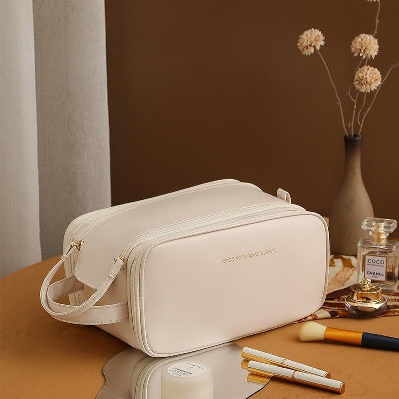 Tragbare Aufbewahrungstasche für Make-up und Kosmetik mit großem Fassungsvermögen für Reisen. Neue Waschtasche für Kosmetikpinsel und Schreibtisch-Aufbewahrungstasche