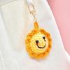Handcrafted Sunflower Keychain: Colorful Smiley Face Bag Charm Pendant – Perfect for Bookbags or as a Decorative Gift.