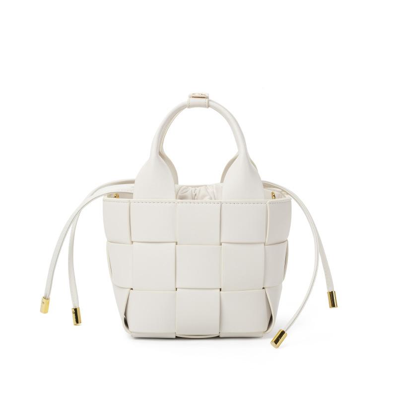 New high-end leather woven vegetable basket women's bag niche design women's soft cowhide portable messenger bucket bag