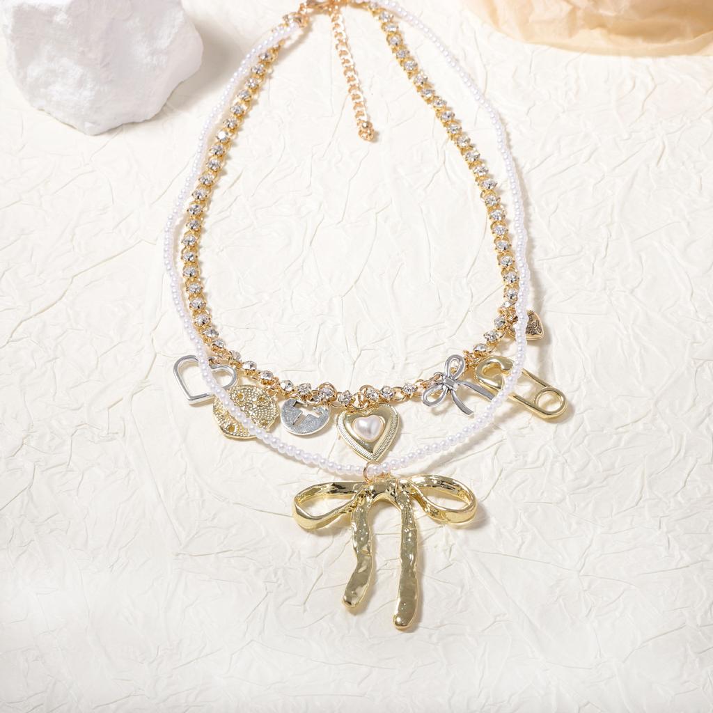 Fashion niche creative design sense double-layered alloy bow pendant necklace versatile temperament model