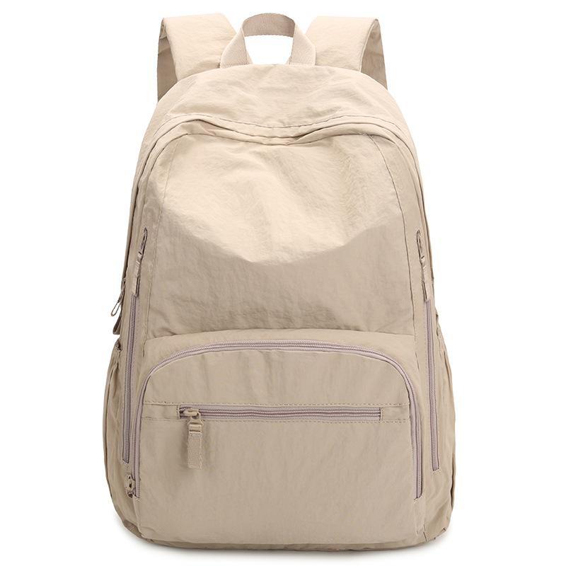 Ryggsäck i enfärgat dam lätt utomhusryggsäck stor kapacitet student skolväska