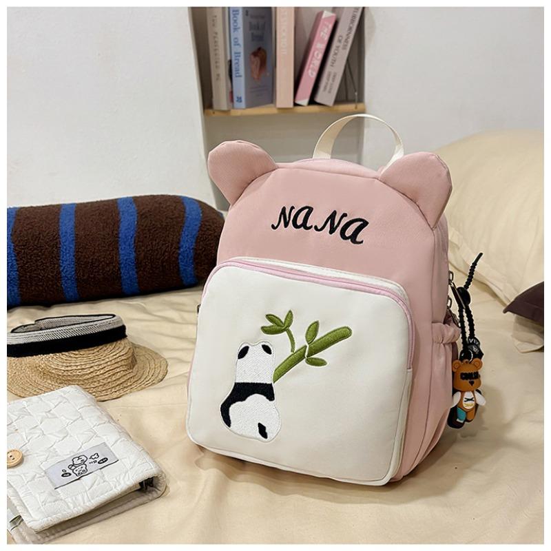 The new schoolbag is high-value, fresh, sweet and cute, red panda backpack, kindergarten level 1-3 large-capacity backpack.