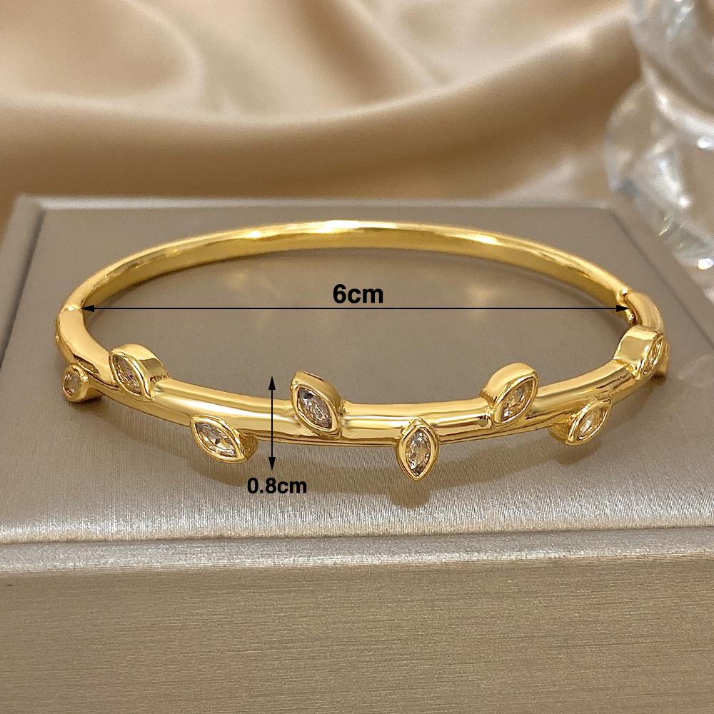 Freetry Exquisite Zircon Golden Plated Bracelet Bangle for Women Luxury Hollow Out Heart Spring Bangle Female Jewelry Gift
