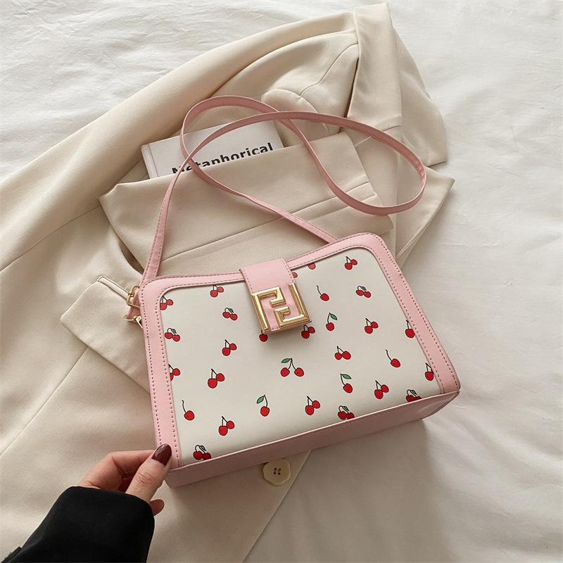 

Textured fashion handbag women s 2025 summer new trendy niche messenger bag foreign style casual fashionable small square bag розовый