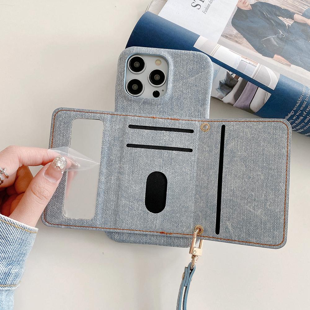 For iPhone 14 Pro Max Case Card Slots Mirror Design Jeans Cloth Texture PU Leather Back Cover with Strap