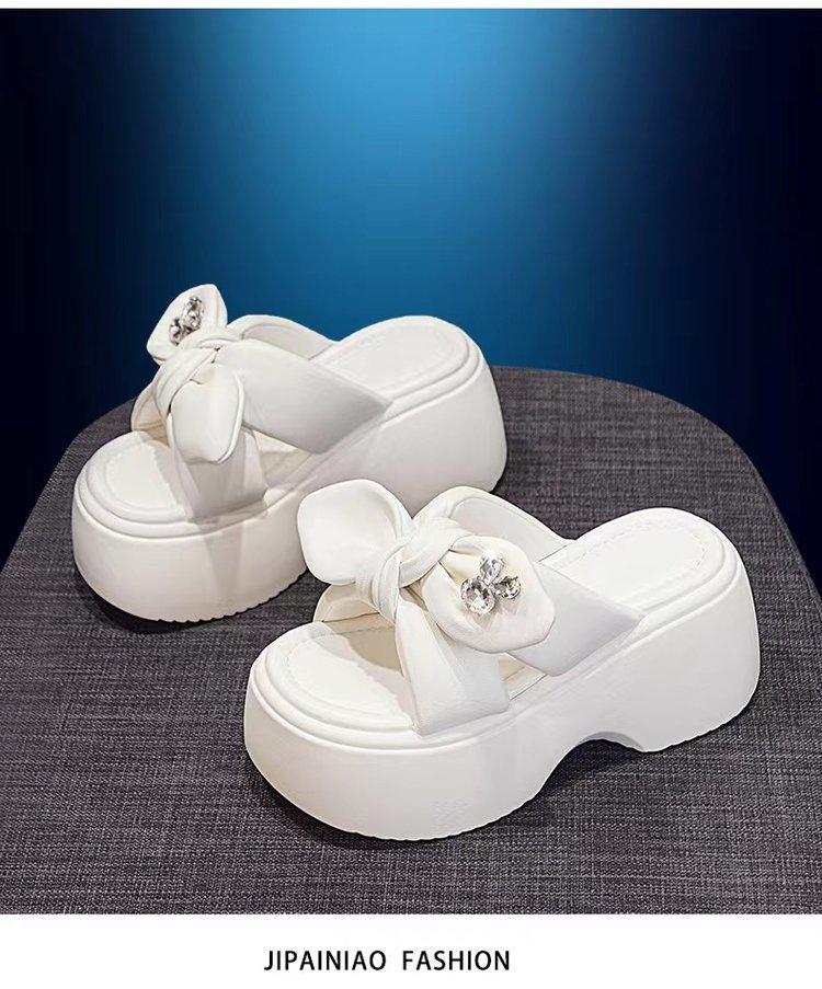 

Summer new thick-soled muffin bottom non-slip round head bow women s high heels ins super fire sandals slippers 39