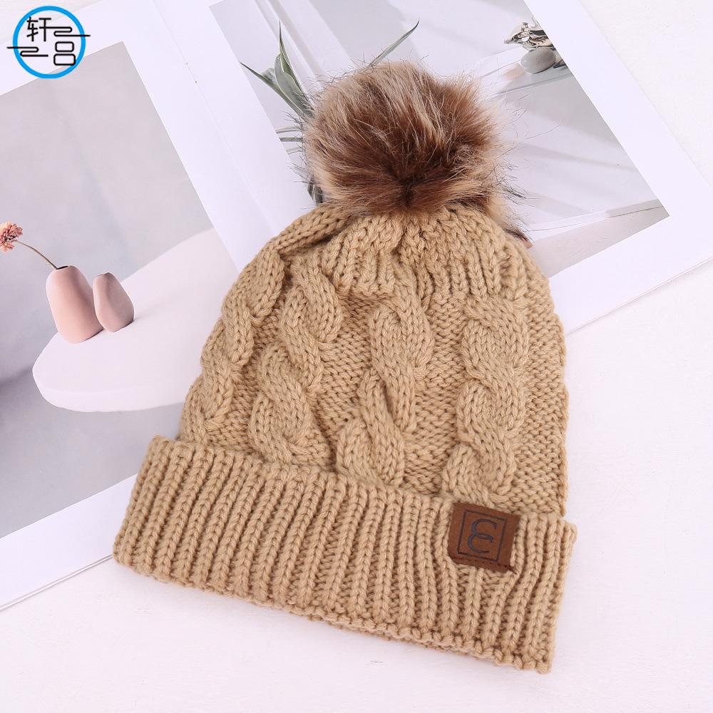 European and American fashion solid color simple warm comfortable knitted hat hairball decoration windproof face small wool hat