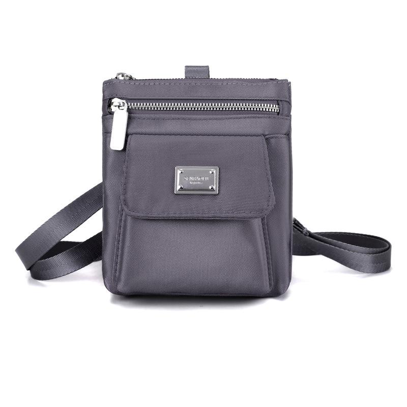 

Compact Nylon Crossbody Bag for Women – Lightweight & Water-Resistant Design with Metal Logo Plate and Multiple Pockets, Ideal for Daily Use темно-фіолетовий колір