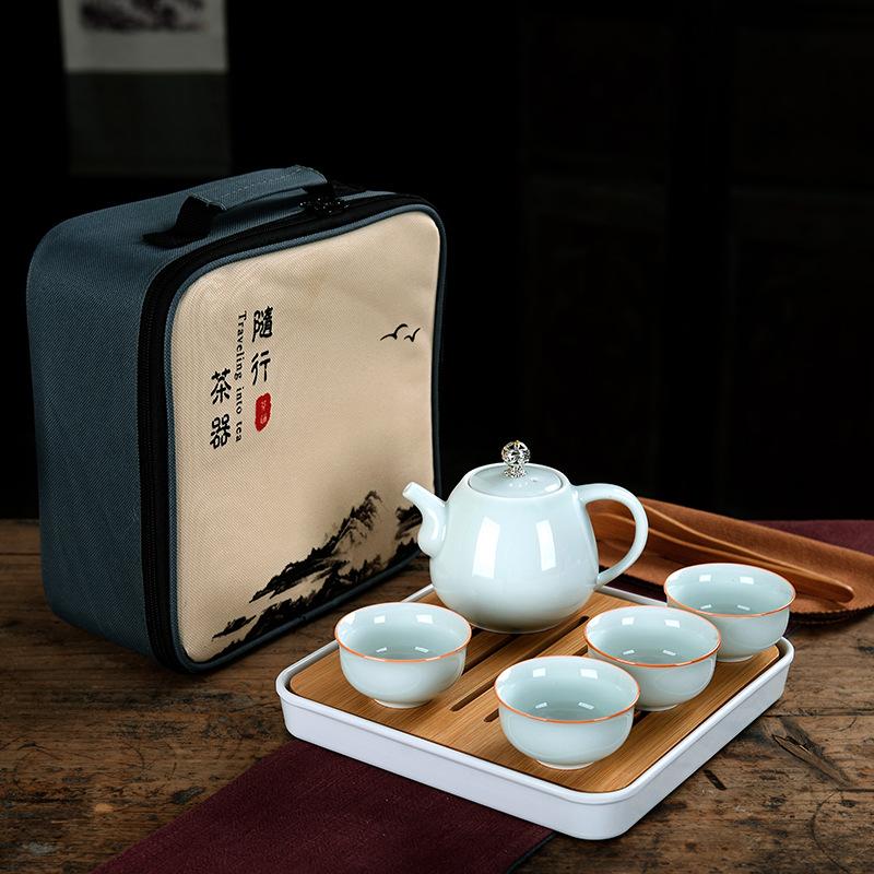 

Дорожный чайный набор керамический удобный бытовой один чайник четыре чашки рекламный бизнес-набор кунг-фу подарок чайный набор Ruyi pot: four cups in one pot