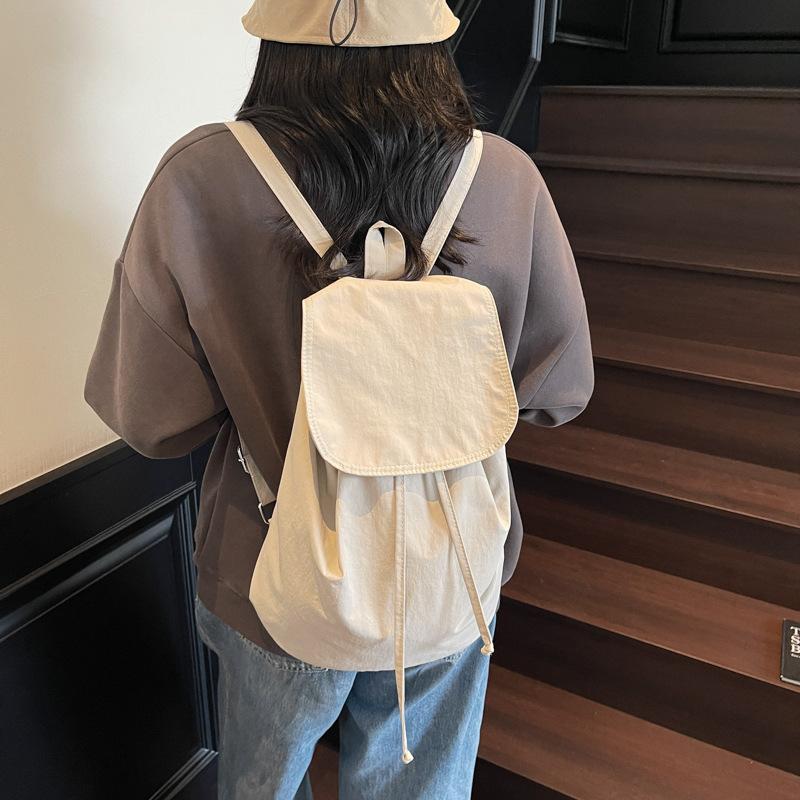 New summer simple leisure travel backpack schoolbag large capacity lightweight backpack men and women