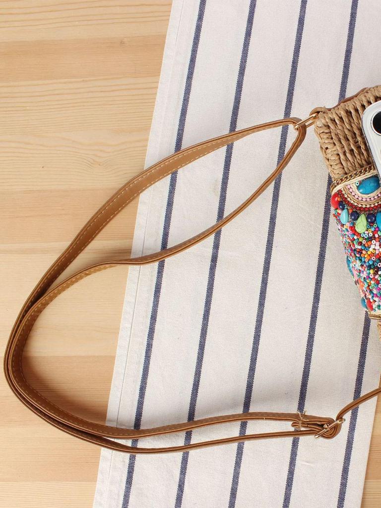 Minimalistisk vävd crossbody-väska i pappersrep för semester vid havet