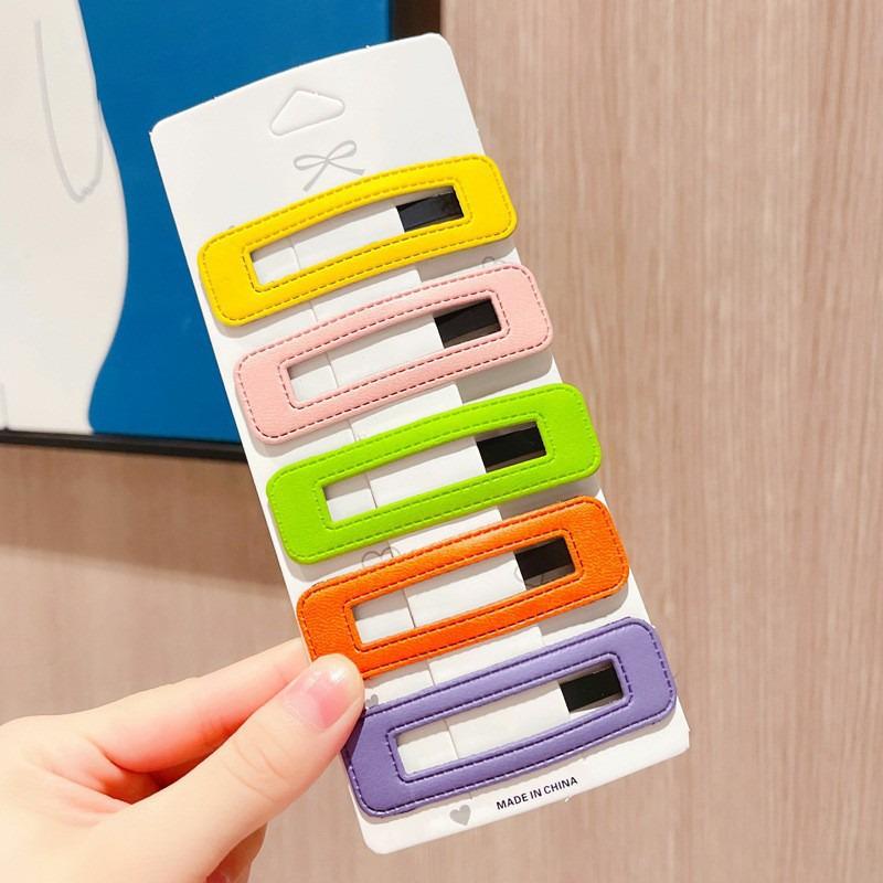 Candy Color PU Leather Hair Clip: Bun, Bangs & Side Clip for Women.
