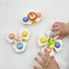 A Set of Three Cartoon Animal Suction Cup Spinning Tops for Babies, Designed To Enhance Hand-Eye Coordination During Early Education