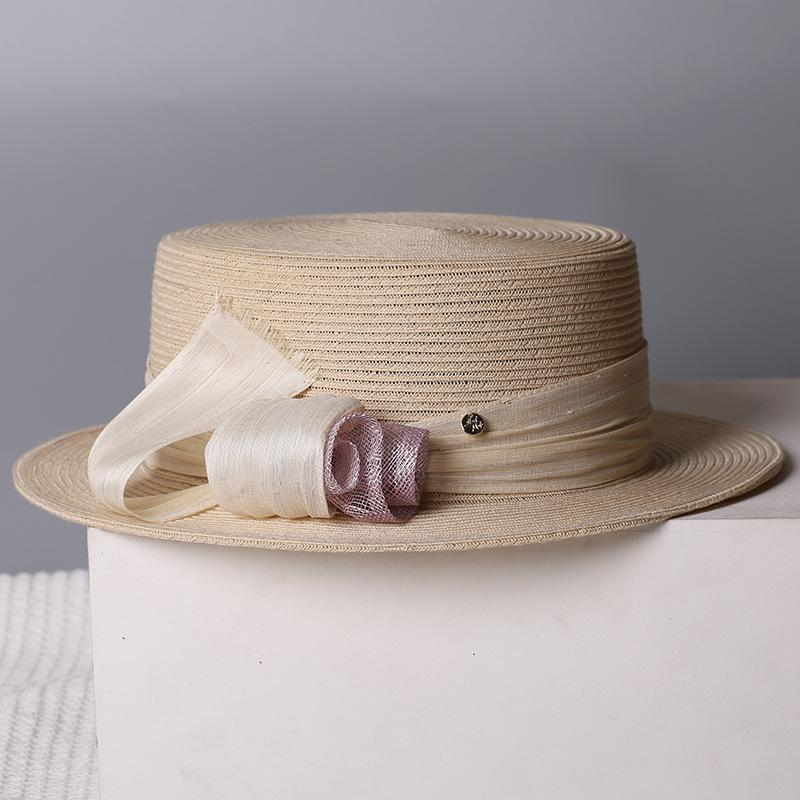 Nouveau chapeau de paille d'été pour femmes, style français haut de gamme rétro Hepburn, chapeau de soleil à large bord, protection solaire pour visage fin