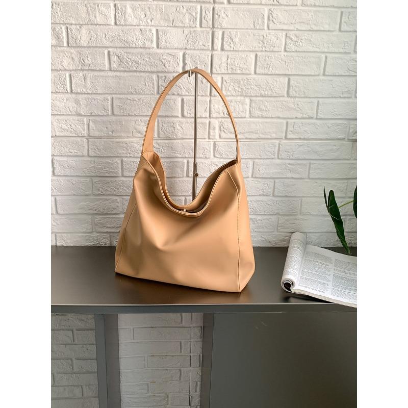 

Large-capacity tote bag women s solid color simple soft leather commuter large bag niche fashion shoulder bag women абрикосовый