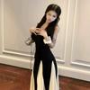 French high-end black and white splicing suspender dress Hepburn style beautiful unique temperament waist a word long dress summer