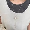 Silver Hollow Flower Pull Necklace Women's Light Luxury Niche High-end Clavicle Chain Summer Atmosphere Accessories