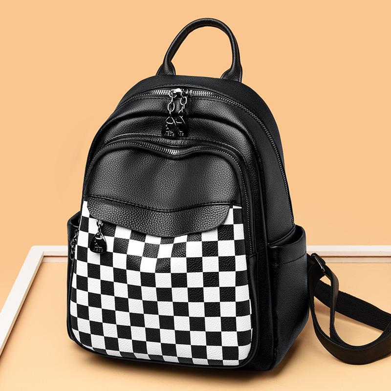 Schoolbag1011 spring and summer new fashion personality trend temperament double shoulder single shoulder PU backpack women's bag manufacturer