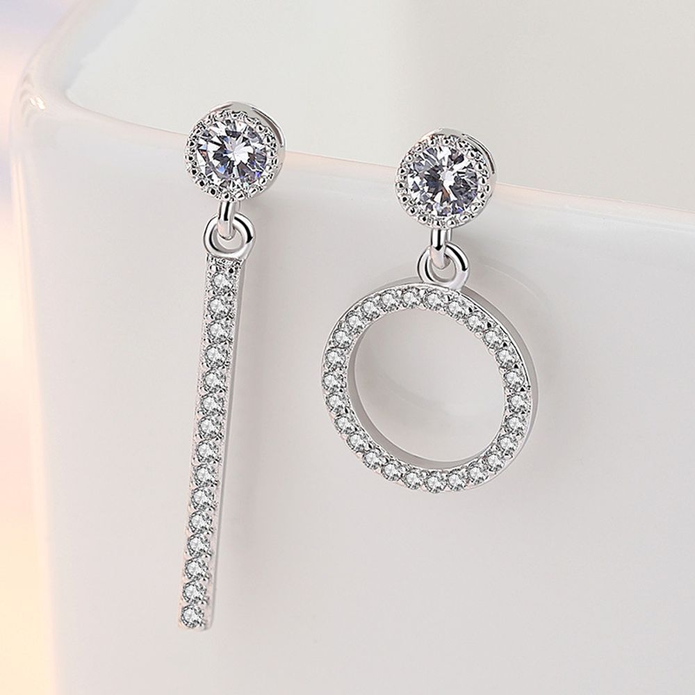 Unbalanced AAA zirconia ring pair of earrings in a gift box