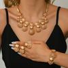 Women's Necklace Earrings Ring Bracelet Set Four Pieces Hollow Round Pattern Metal Jewelry Set for Daily Wear and Special Occasions