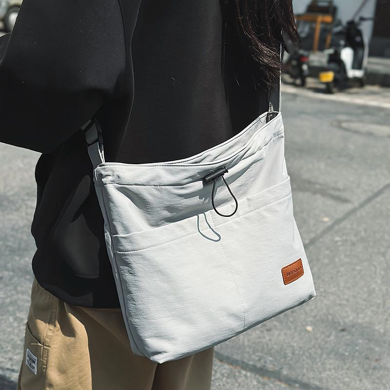 Crossbody bag men's ins trendy Japanese simple large capacity men's backpack couple shoulder bag women's casual student shoulderbag