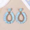 Exaggerated Handmade Retro Rattan Raffia Geometric Earrings Ethnic Style Summer Beach Women'S Tassel Earring