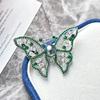 High-End Silver-Green Butterfly Brooch: Women's Gold-Plated Copper Pin, Zircon, and Pearl
