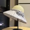 Korean-style elegant floral-decorated wide-brimmed straw fisherman hat for women2026New Spring and Summer Beach Sunshade Trend