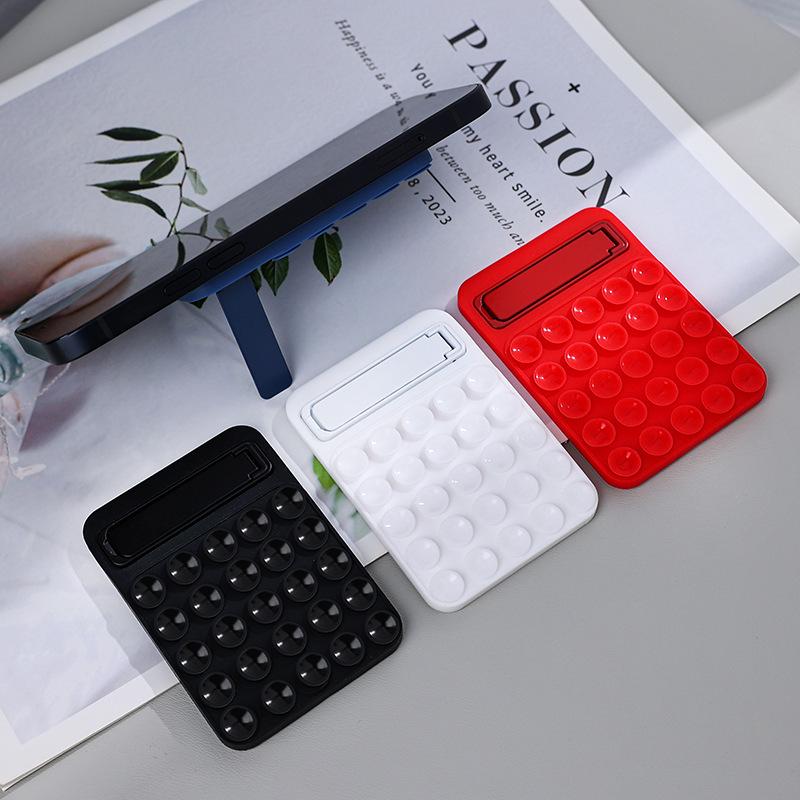 Βάση Κινητού Σιλικόνης Μονοκόμματη με Βεντούζα: Πολυλειτουργικό, Μαγνητικό, Πτυσσόμενο, Αυτοκόλλητο, Αντιολισθητικό για Επιφάνεια Γραφείου και Γυαλί.