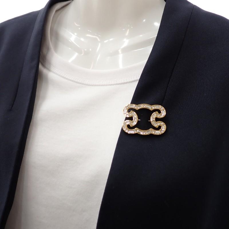 CELINE 461FQ6SBS.35OR Broche guld krystal/metal Kvinder