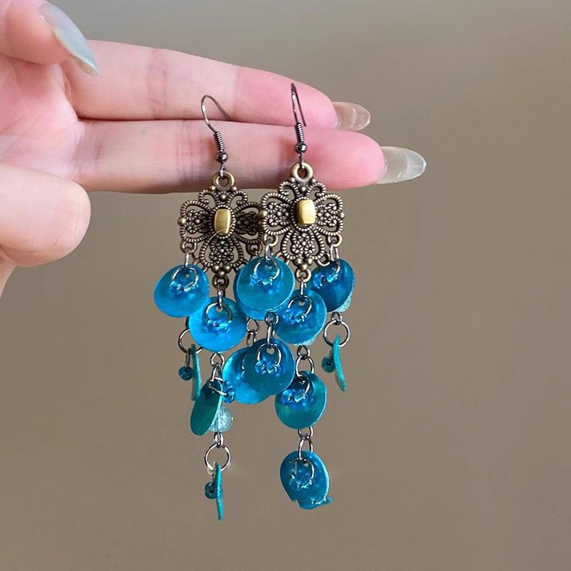 

Богемные серьги с кисточками: Этнический стиль, Универсальные дорожные аксессуары