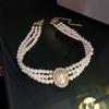Women's Multi-Layer Pearl & Diamond Oval Necklace: Retro Hepburn Style, Light Luxury, Perfect for Sweaters and Dressy Outfits.
