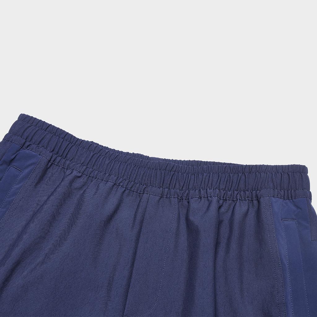 Fila Einfarbige konische lässige gewebte gestrickte Sporthosen Herren Hosen Tiefblau F11M419804F-NV