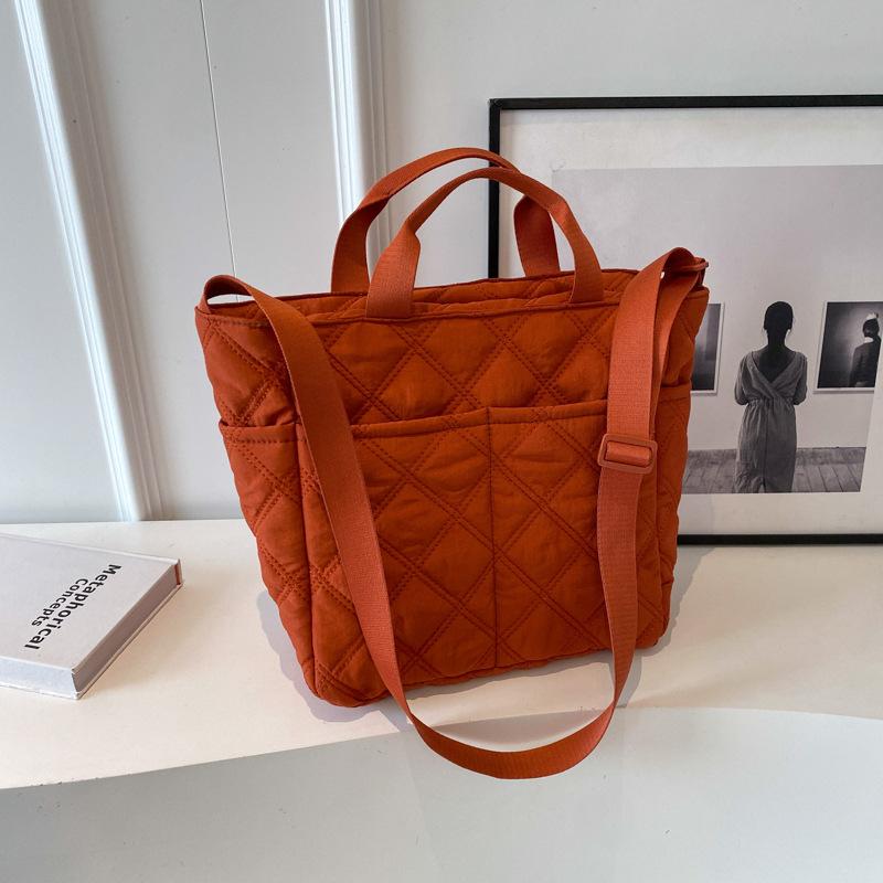 

Large-capacity bag women s autumn and winter new canvas portable tote bag leisure work commuting versatile messenger cotton bag помаранчевий