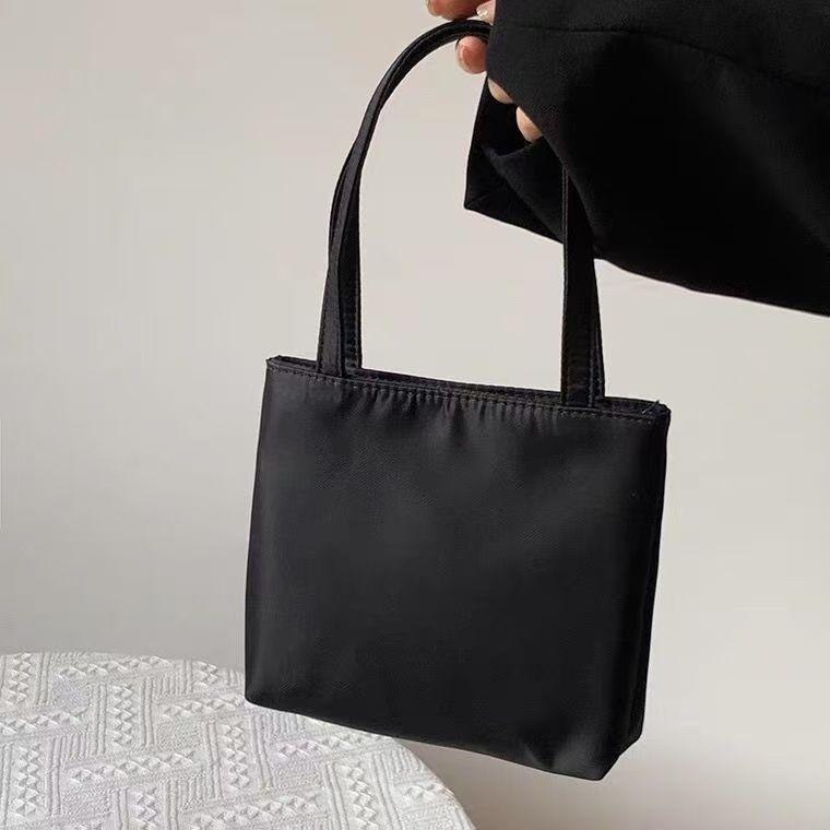 Nylon mini handbag tote women's bag is simple and portable when going out, and office workers carry small bags with new models.