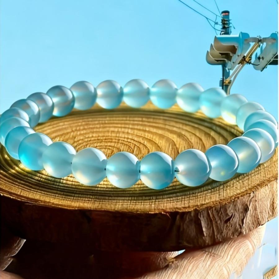 An 8Mm Natural Deep Sea Ice Stone Bracelet Featuring Bohemian Style Stone Jewelry, Serving As a Talisman for Spirit And Luck, Perfect for Casual Wear