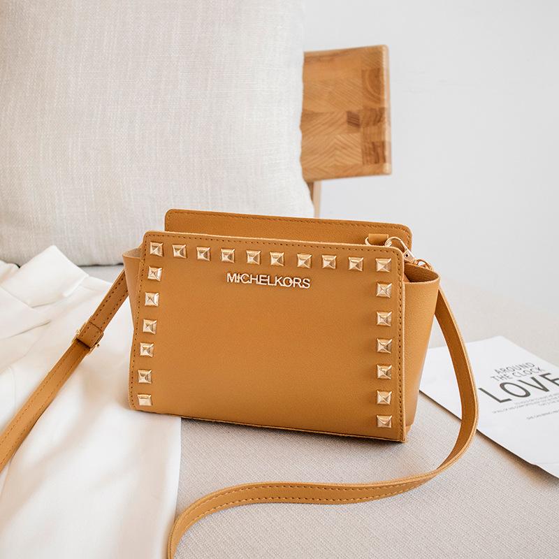 

Oblique span single shoulder smiley face bag new willow nail fashion temperament women s bag светло-коричневого