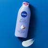 Nivea Wygładzające Mleczko Do Ciała Nawilżające 72H Skóra Sucha 400Ml