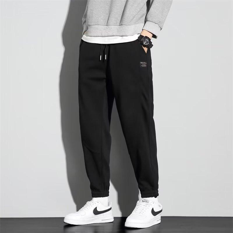 Casual sweatpants summer new loose large size tied feet splicing personalized trendy pants men